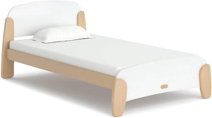 Children's bed with white mattress and wooden frame on a white background