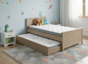 Children's bedroom with a bed and toys, featuring a light blue wall with colorful star decorations.