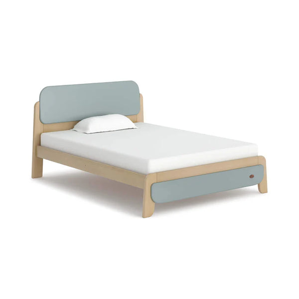 Wooden bed with light gray headboard and footboard on a white background