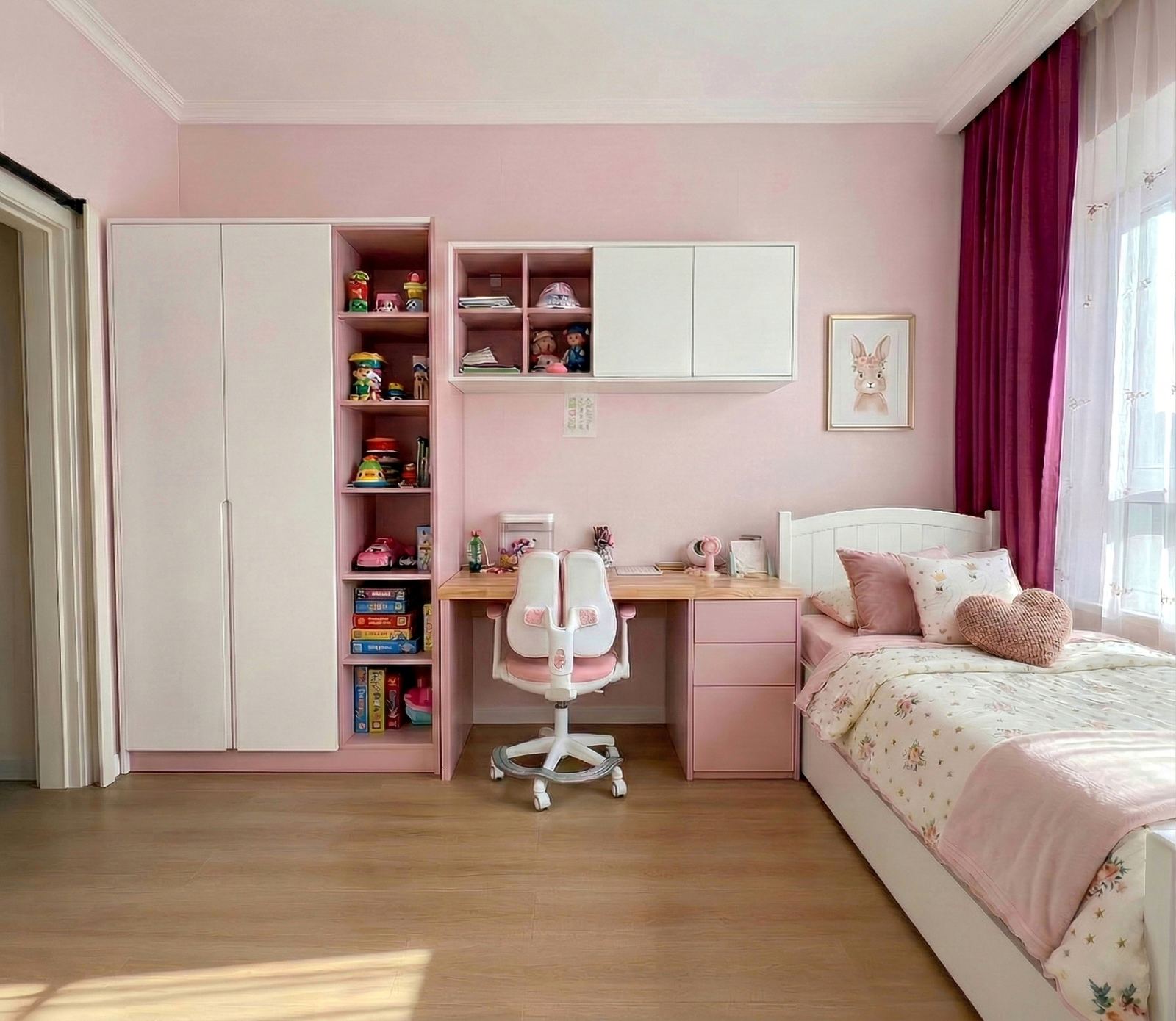 Pink bedroom with a desk, chair, and shelves.