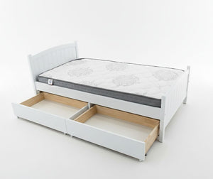 White bed frame with a mattress and wooden drawers on a white background