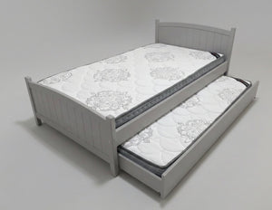 Gray bed with a pull-out trundle on a white background