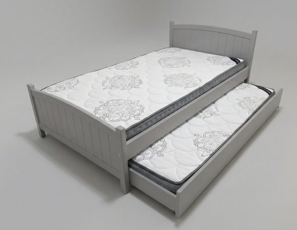 Gray bed with a pull-out trundle on a white background