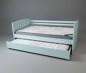 Light blue bed with a pull-out trundle on a gray background