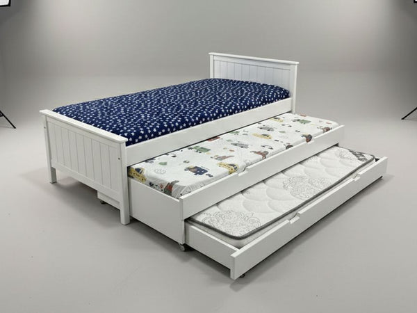 White bed with pull-out trundle and blue mattress on a gray background