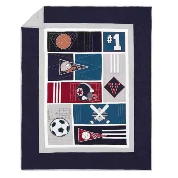 Navy blue blanket with sports-themed pattern featuring various symbols on a white background